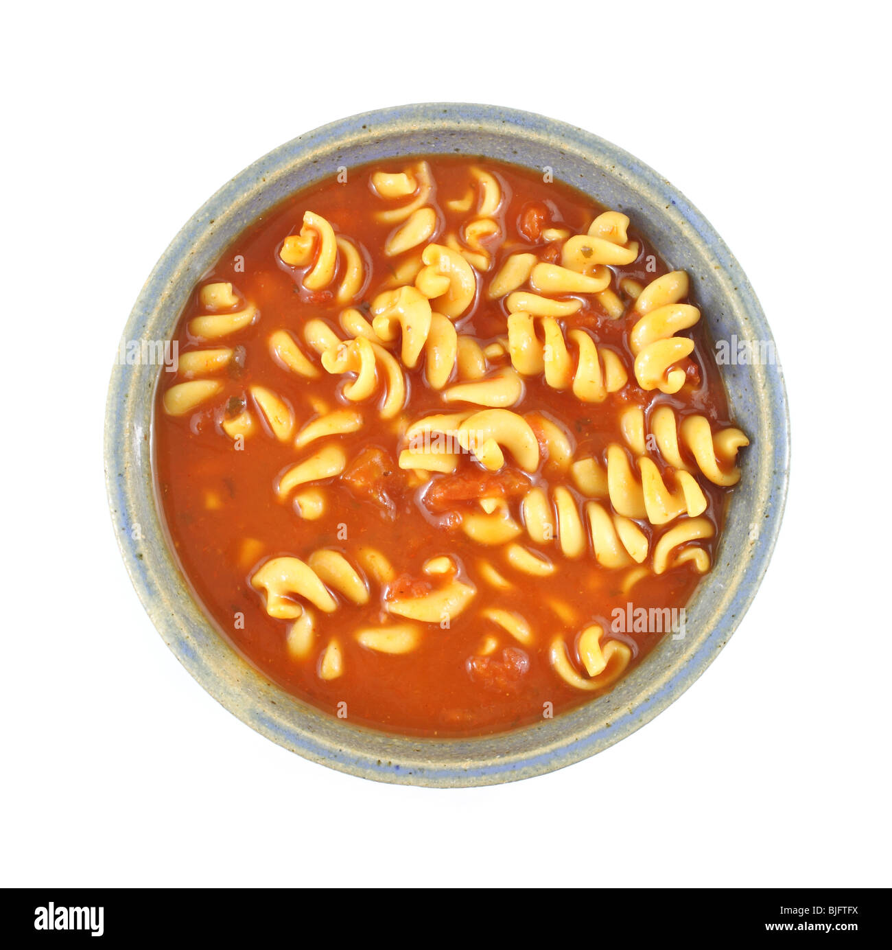 Tomatensuppe mit Nudeln rotini Stockfoto