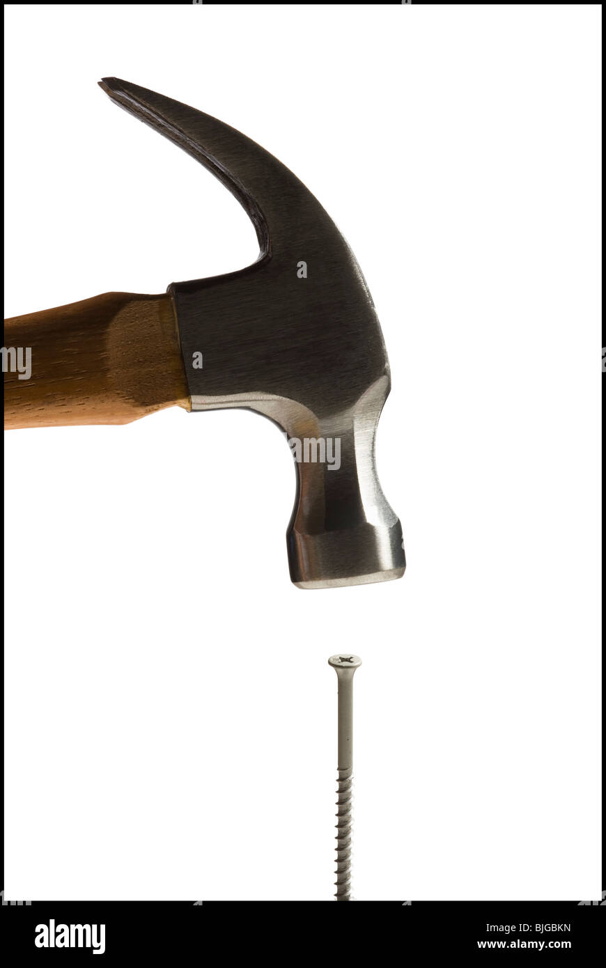 Hammer, die Kollision mit einer Schraube Stockfoto