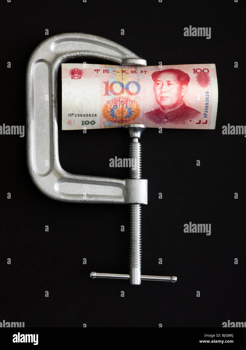 Yuan in einer Klemme Stockfoto