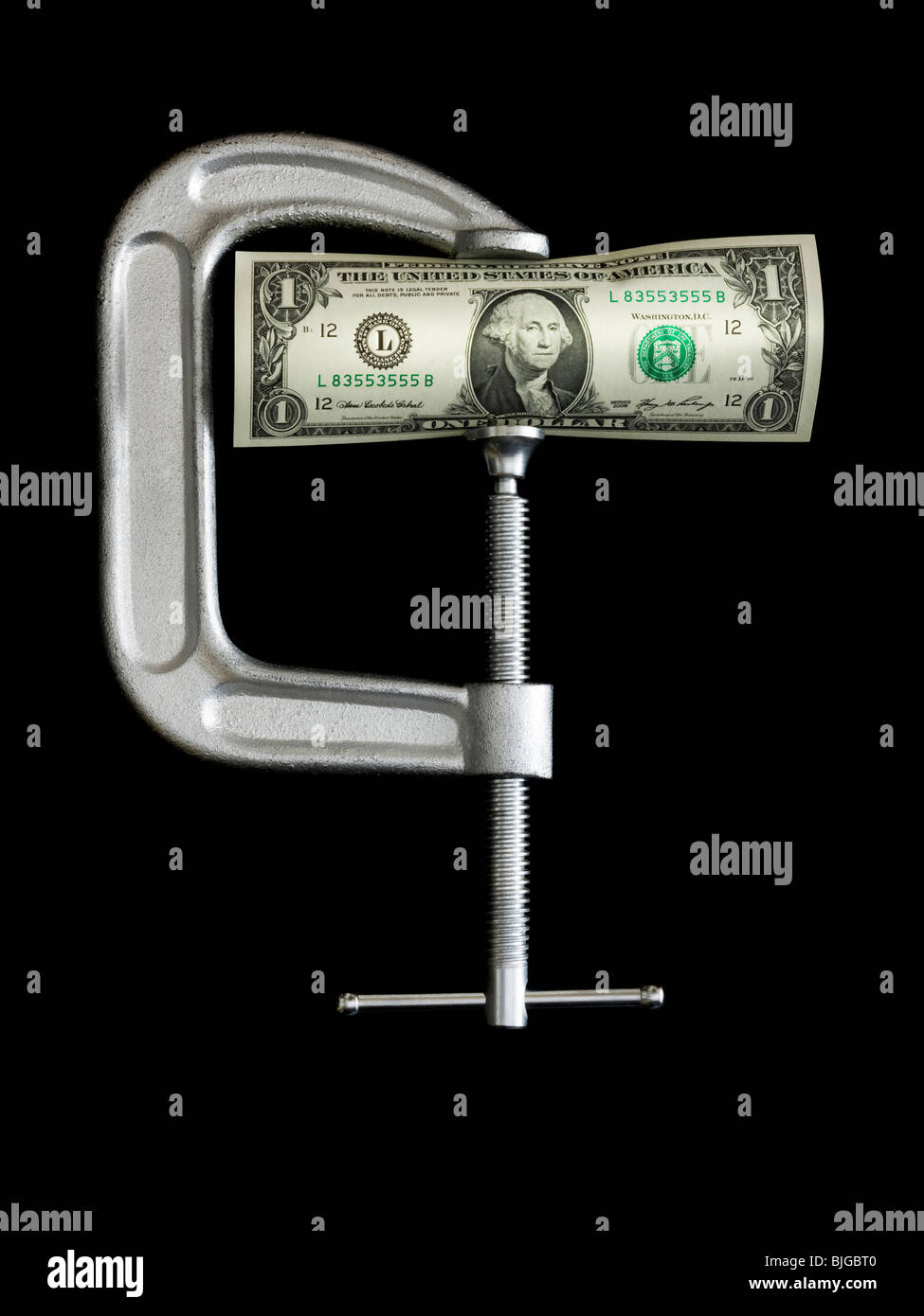 Dollar in einer Klemme Stockfoto