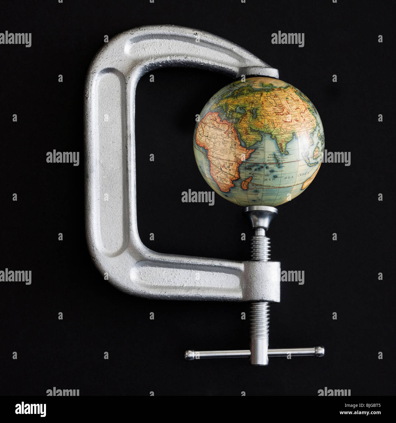 Globus in einer Klemme Stockfoto