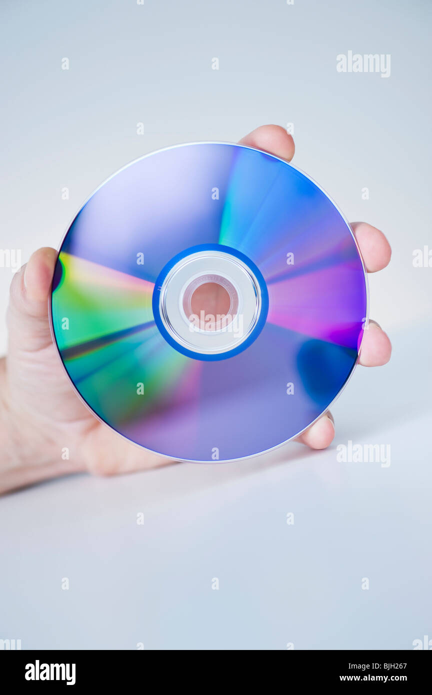 Hand-Holding-CD-ROM Stockfoto