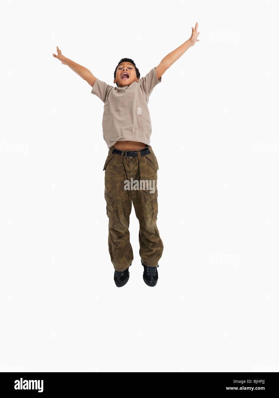 Junge springen Stockfoto