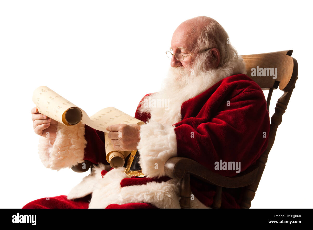 Santa Claus Überprüfung seiner Liste Stockfoto