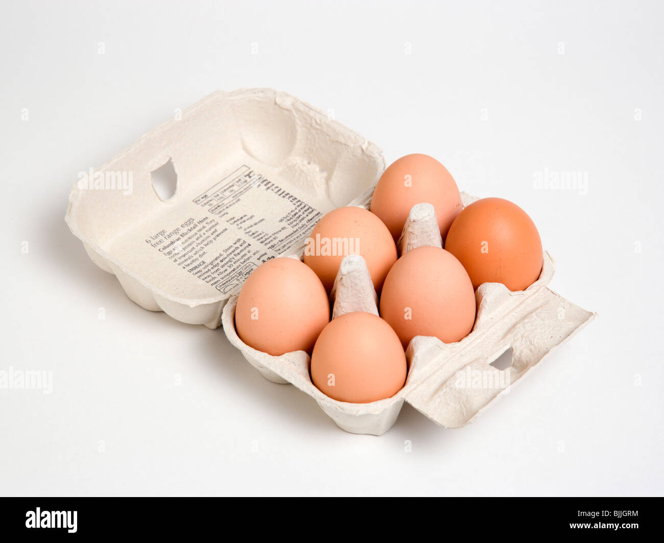 England, East Sussex, Brighton, Essen, Uncooked, Eiern, Schachtel mit sechs Freilandhaltung Eiern auf weißem Hintergrund. Stockfoto
