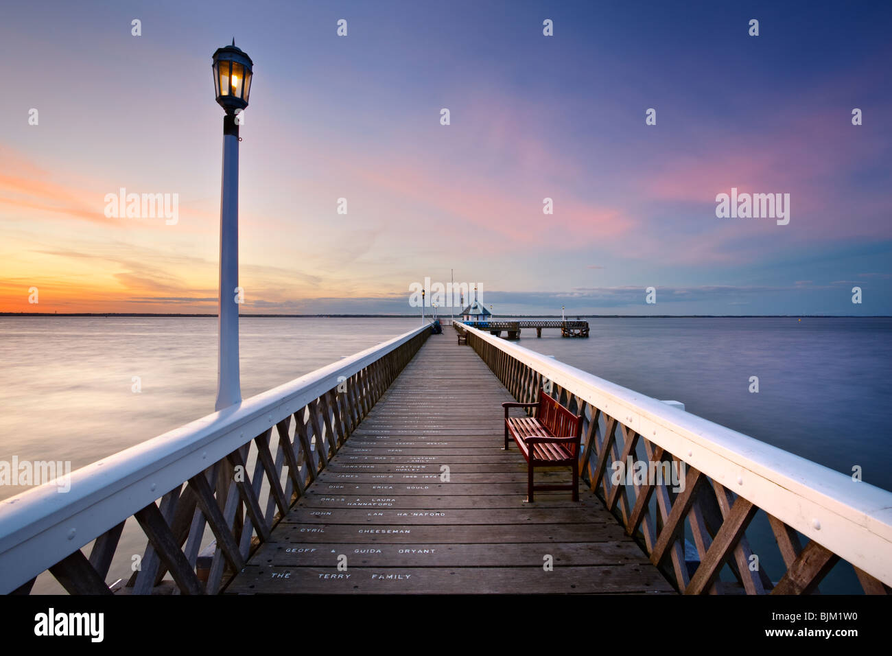 Sonnenuntergang über Yarmouth Pier. Isle Of Wight, England, Vereinigtes Königreich Stockfoto