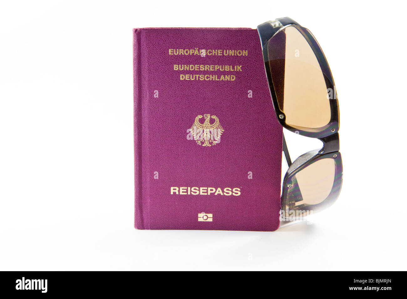Reisepass und eine Sonnenbrille, Urlaubsreise Stockfoto