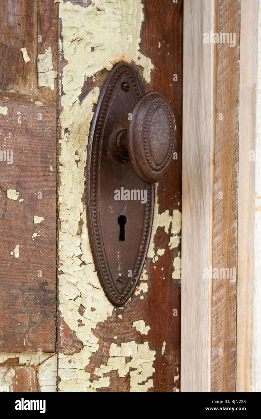 Antike Tür und Knopf Stockfoto