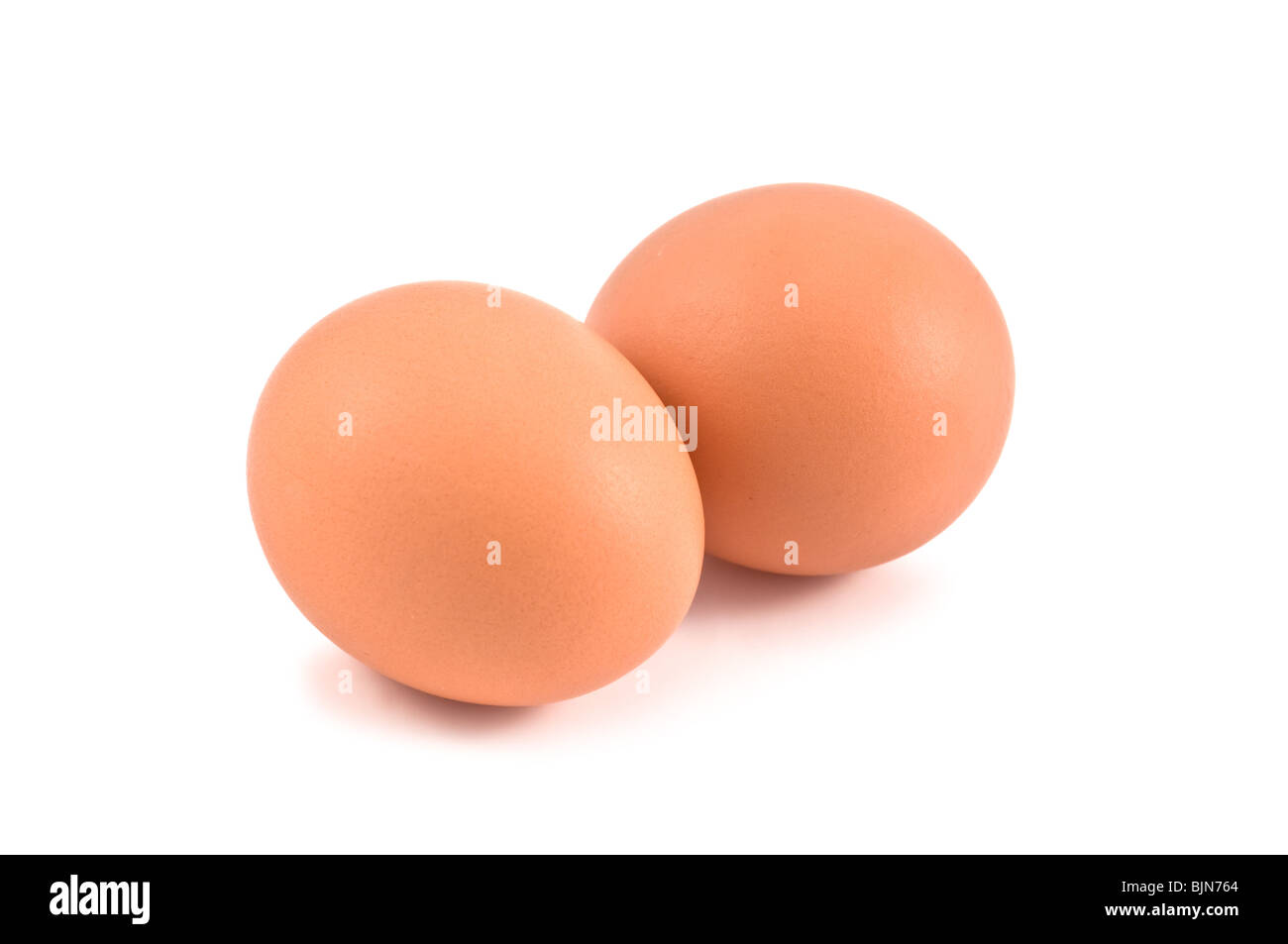 zwei Eiern isoliert auf weiss Stockfoto