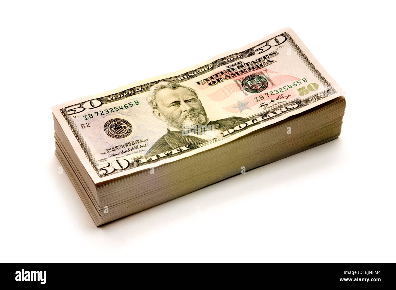 Stapel von amerikanischen Geld auf weißem Hintergrund Stockfoto