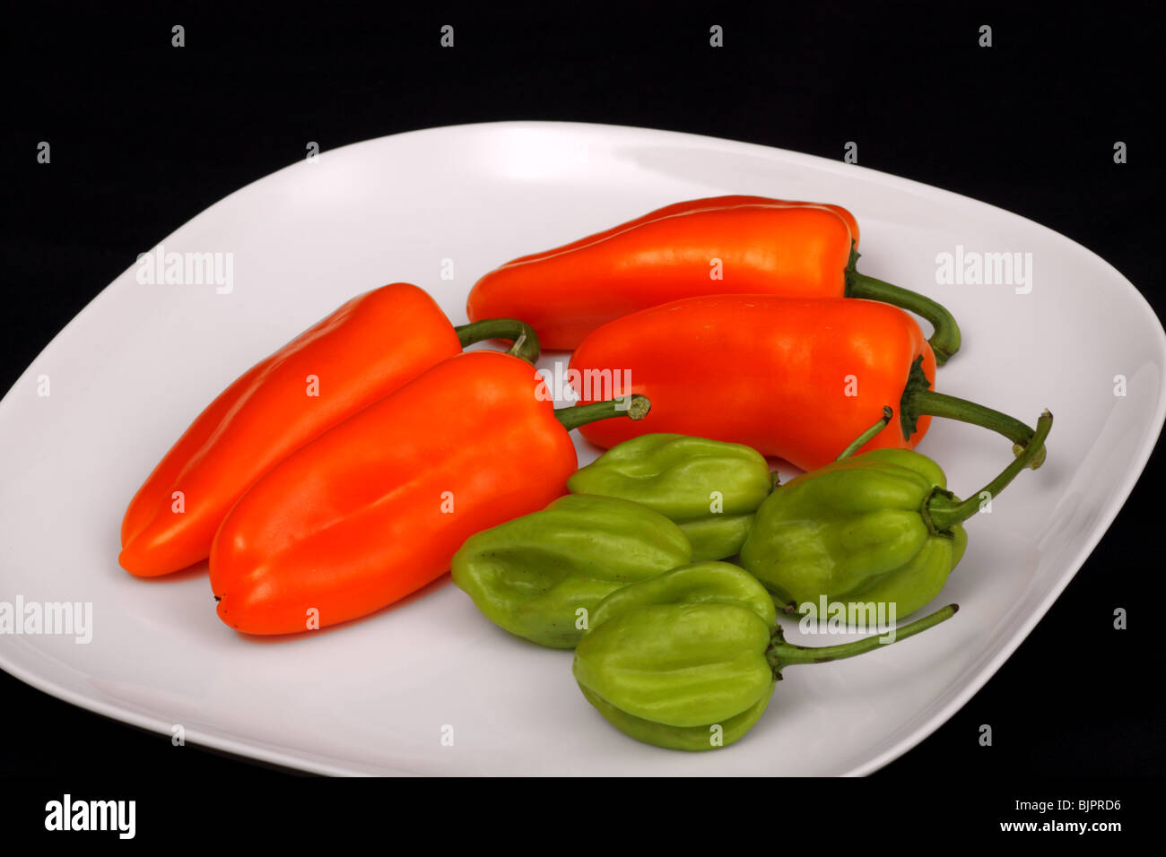 Orange Paprika und Grün, heiß, die Motorhaube cotch', Chili, Paprika Stockfoto