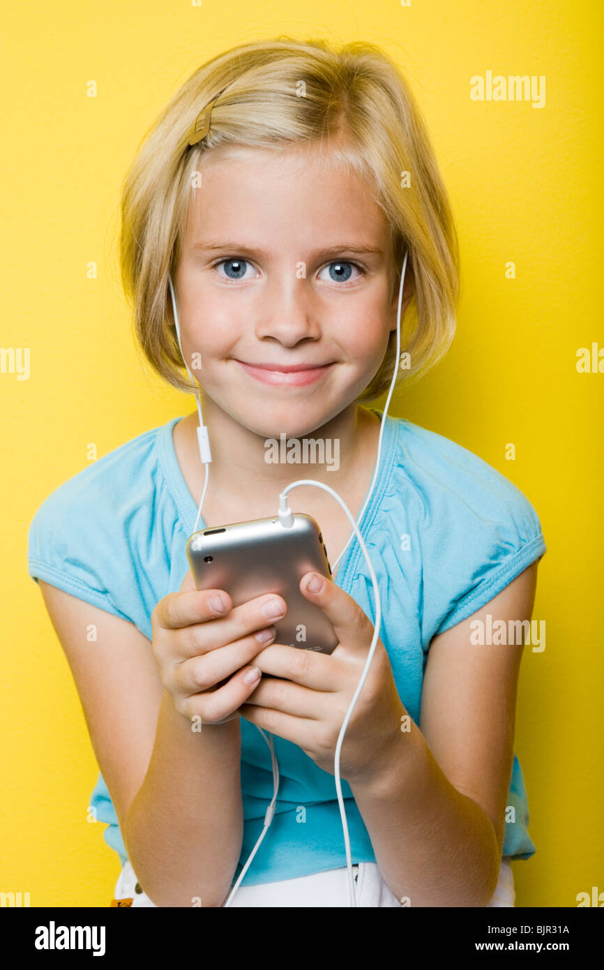 Mädchen mit einem iPhone. Stockfoto