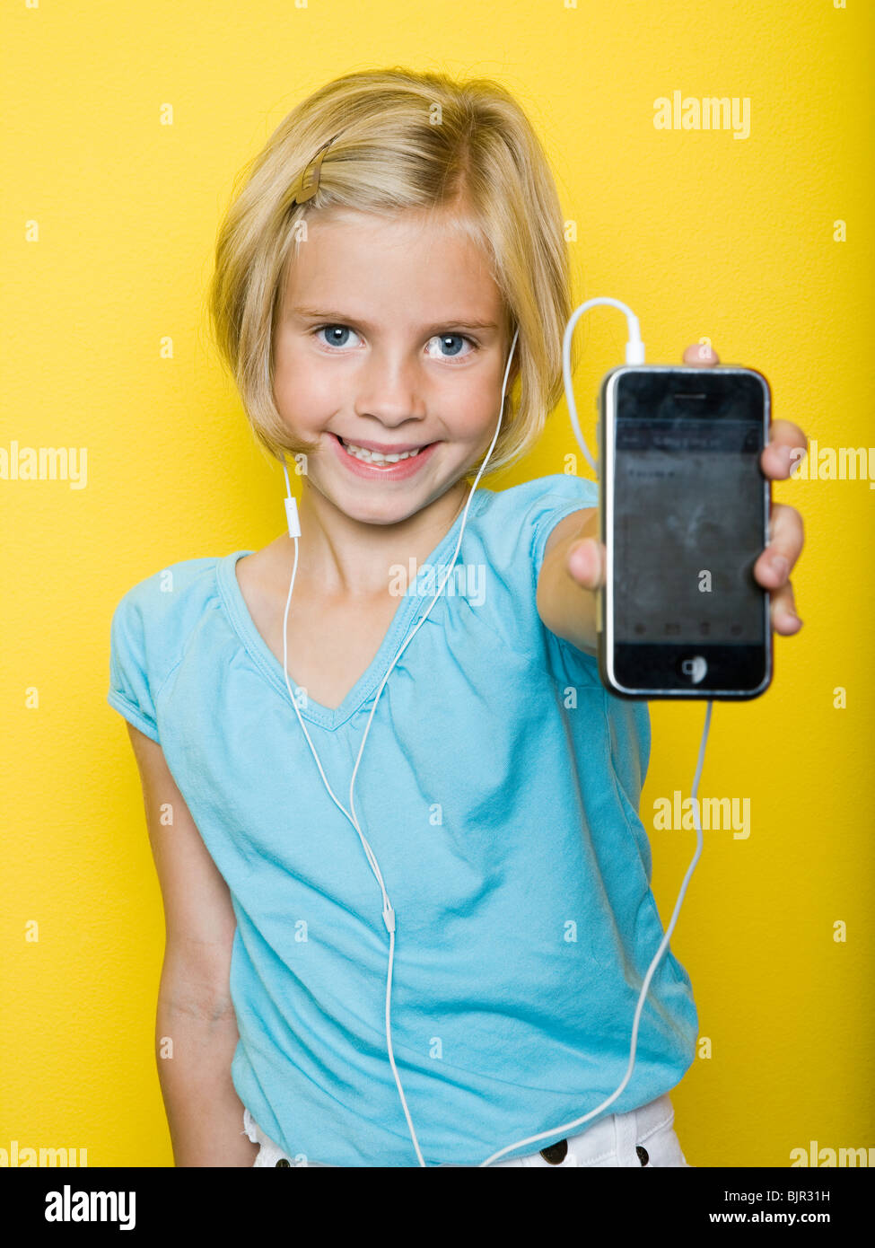 Mädchen mit einem iPhone. Stockfoto