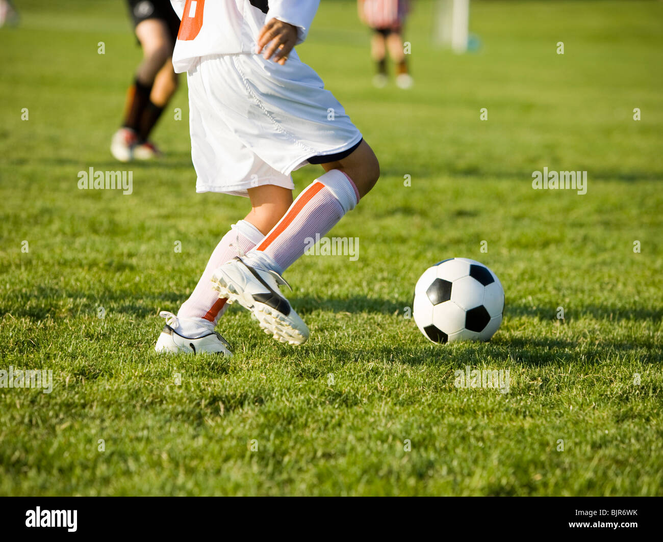junge Fußballspieler und-Trainer Stockfoto