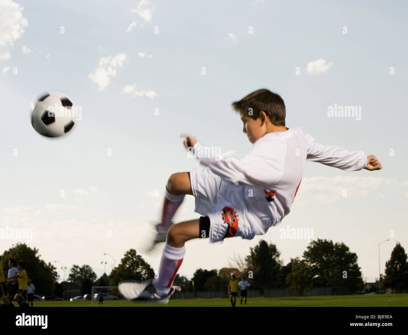 junge Fußballspieler und-Trainer Stockfoto