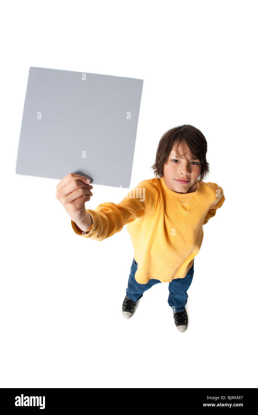 Boy Holding Zeichen Stockfoto