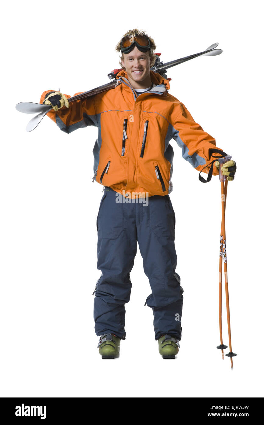 Männlichen Skifahrer in orange Skijacke Stockfoto