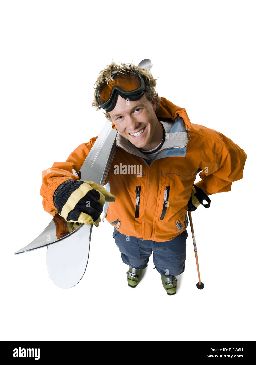 Männlichen Skifahrer in orange Skijacke Stockfoto