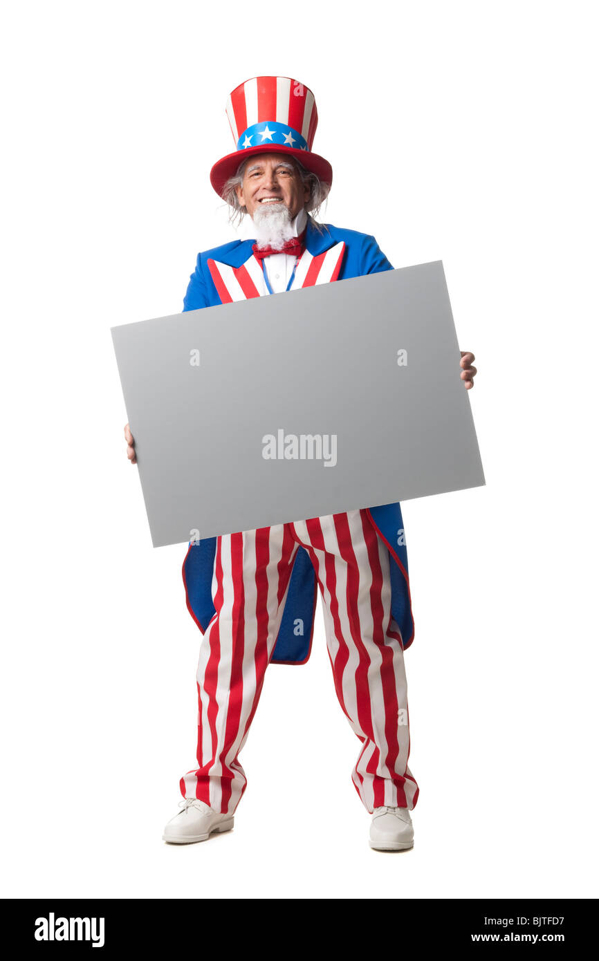 Mann in Uncle Sam Kostüm leeres Papier, Studio gedreht halten Stockfoto