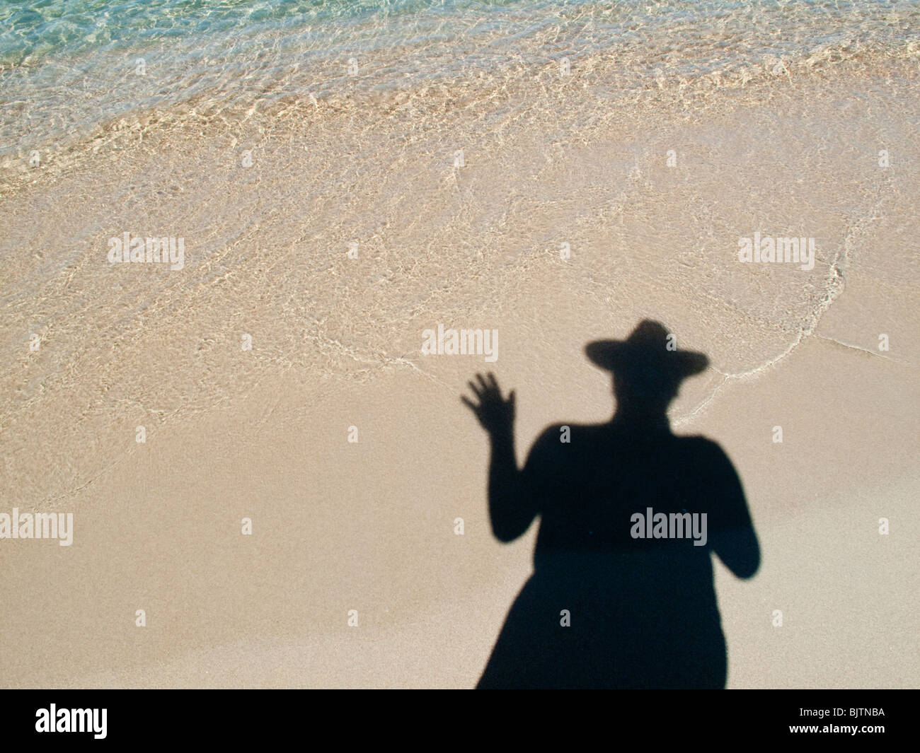 Schatten des Mannes auf Strand, Meer und sand Stockfoto