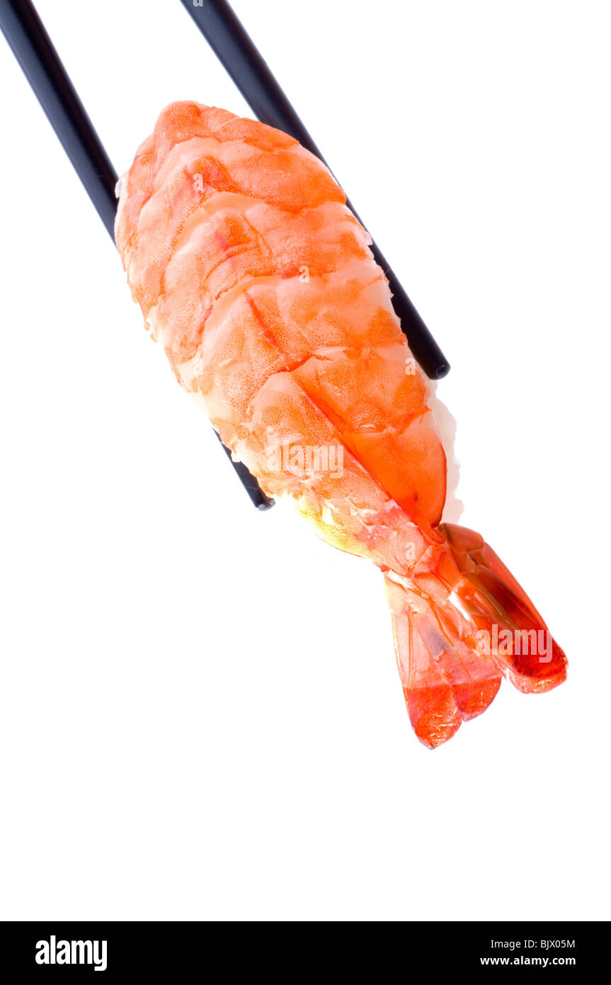 Sushi mit Stäbchen erschossen auf weiß Stockfoto