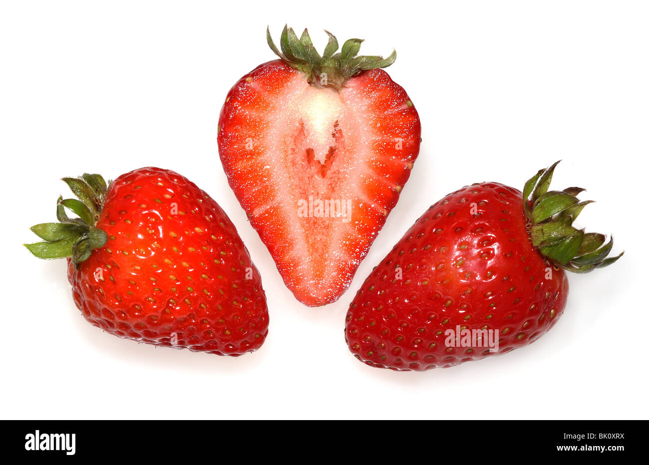 Drei bunte frische Erdbeeren Stockfoto