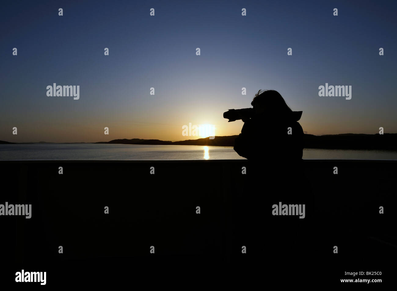Fotograf bei Sonnenuntergang Stockfoto