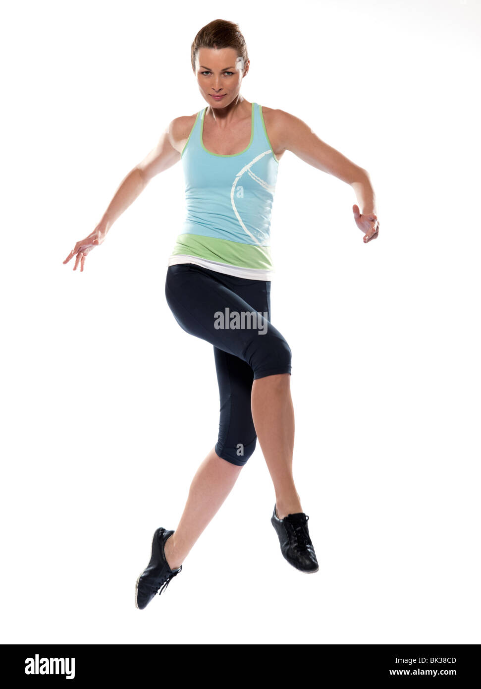 Frau läuft auf Studio weiß isoliert-Hintergrund Stockfoto
