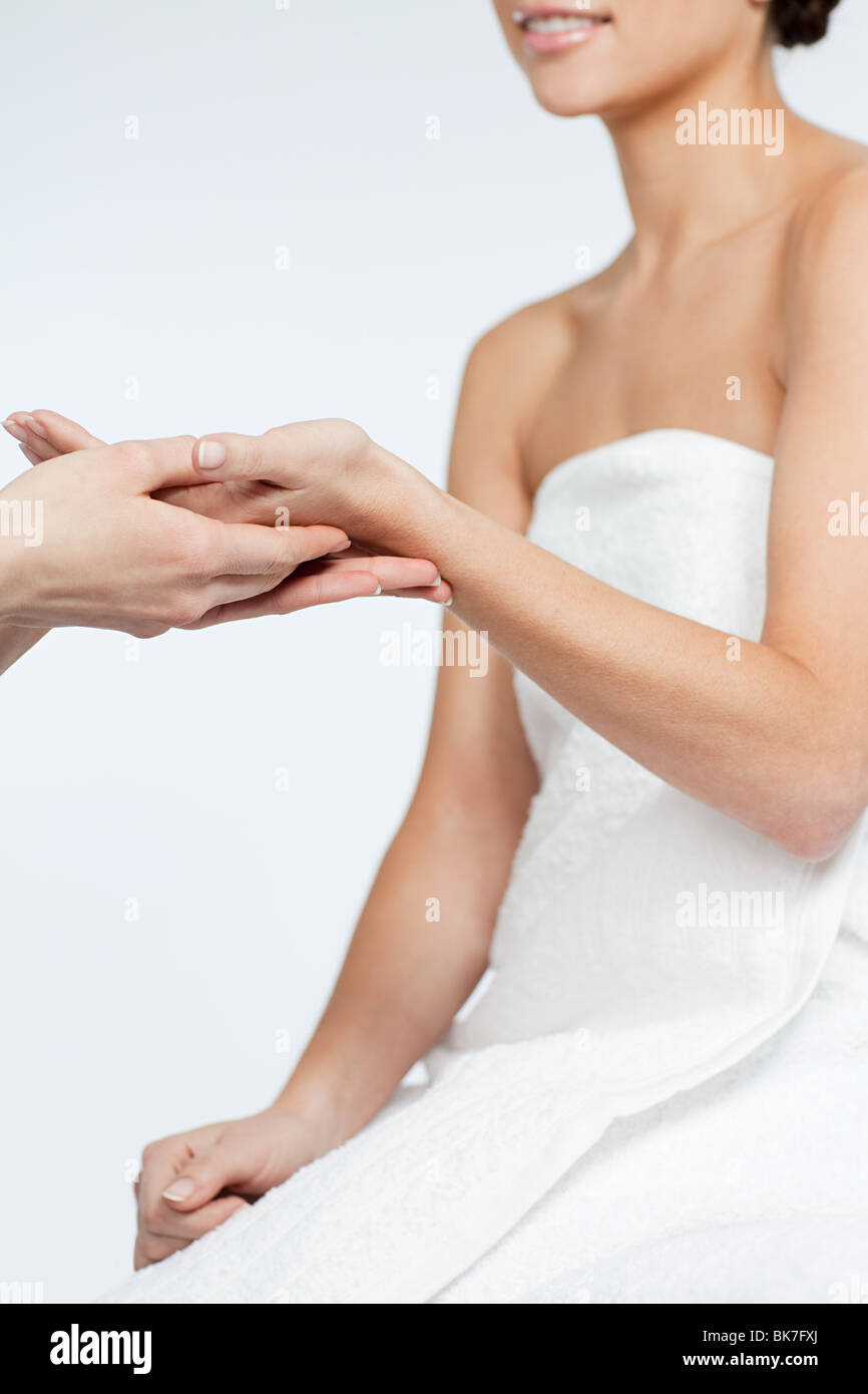 Frau mit Handmassage Stockfoto