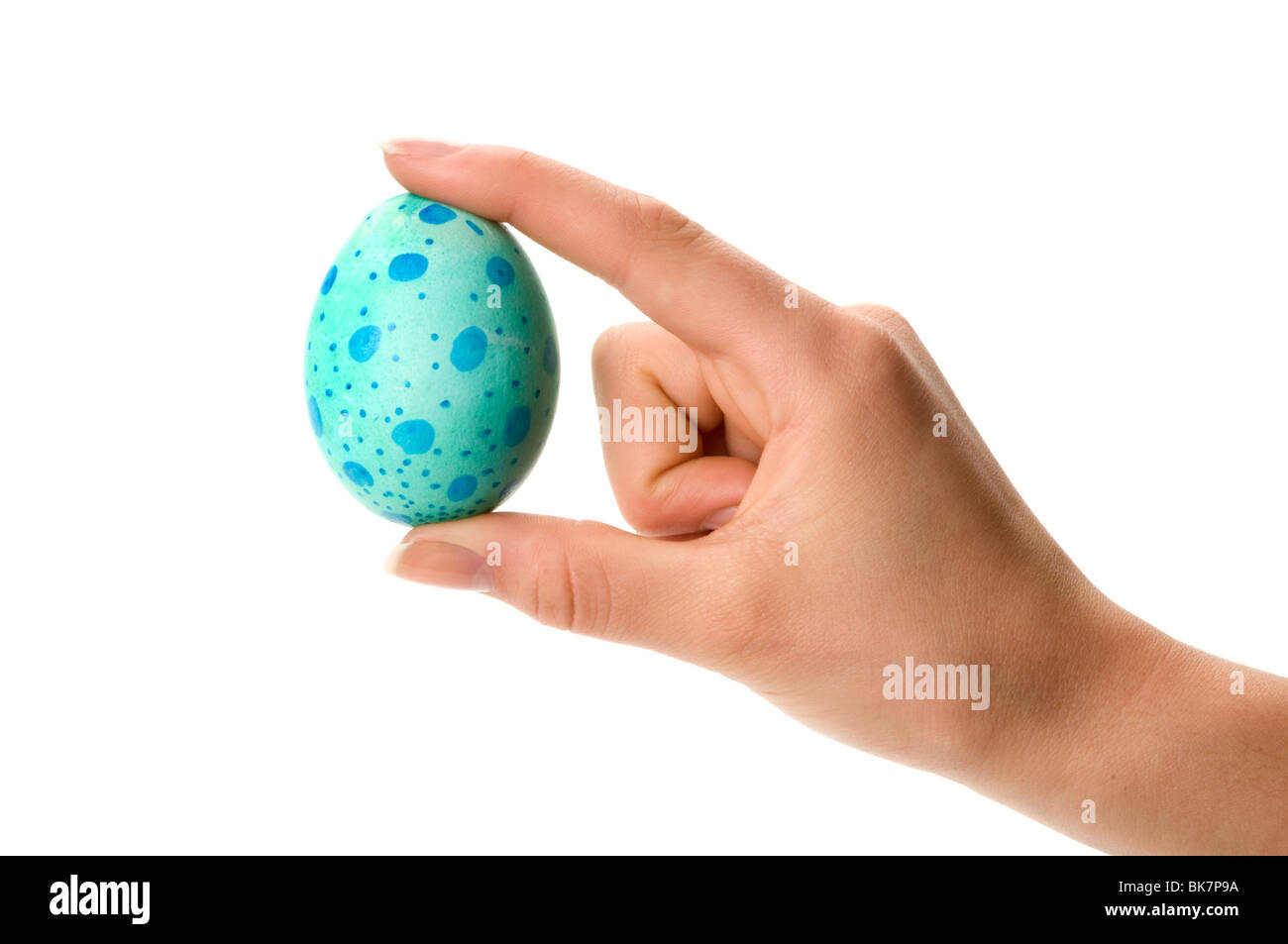 Hand halten, dass Ostern Ei gefärbt Stockfoto