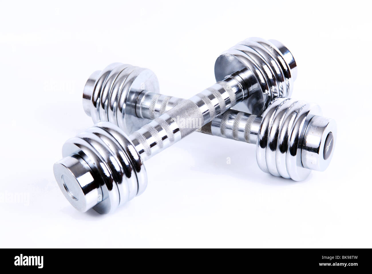 Silber Hanteln auf weißem Hintergrund Stockfoto