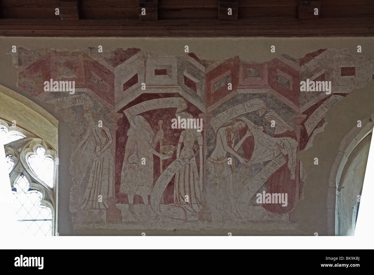 Mittelalterliche Wandmalerei Darstellung Taten der Barmherzigkeit Stockfoto