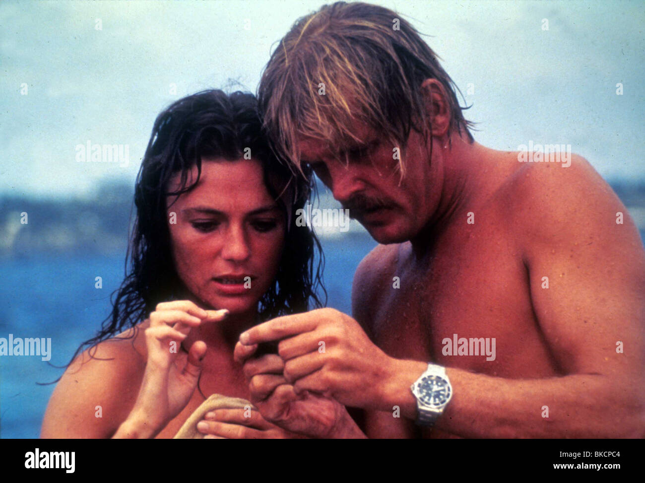 DIE TIEFE (1977) JACQUELINE BISSET, NICK NOLTE TDP 008 Stockfoto