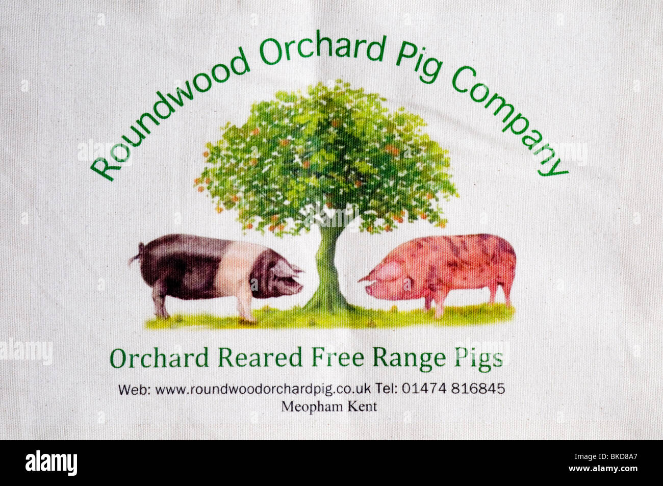 Rundholz-Obstgarten-Schwein-Unternehmen auf einer Segeltuchtasche gedruckt. Stockfoto