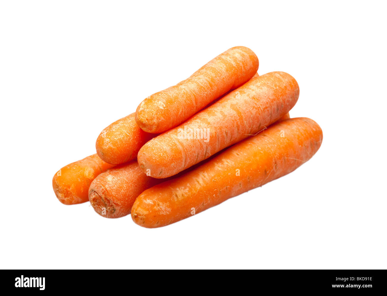 Stapel von Karotten auf weiß Stockfoto