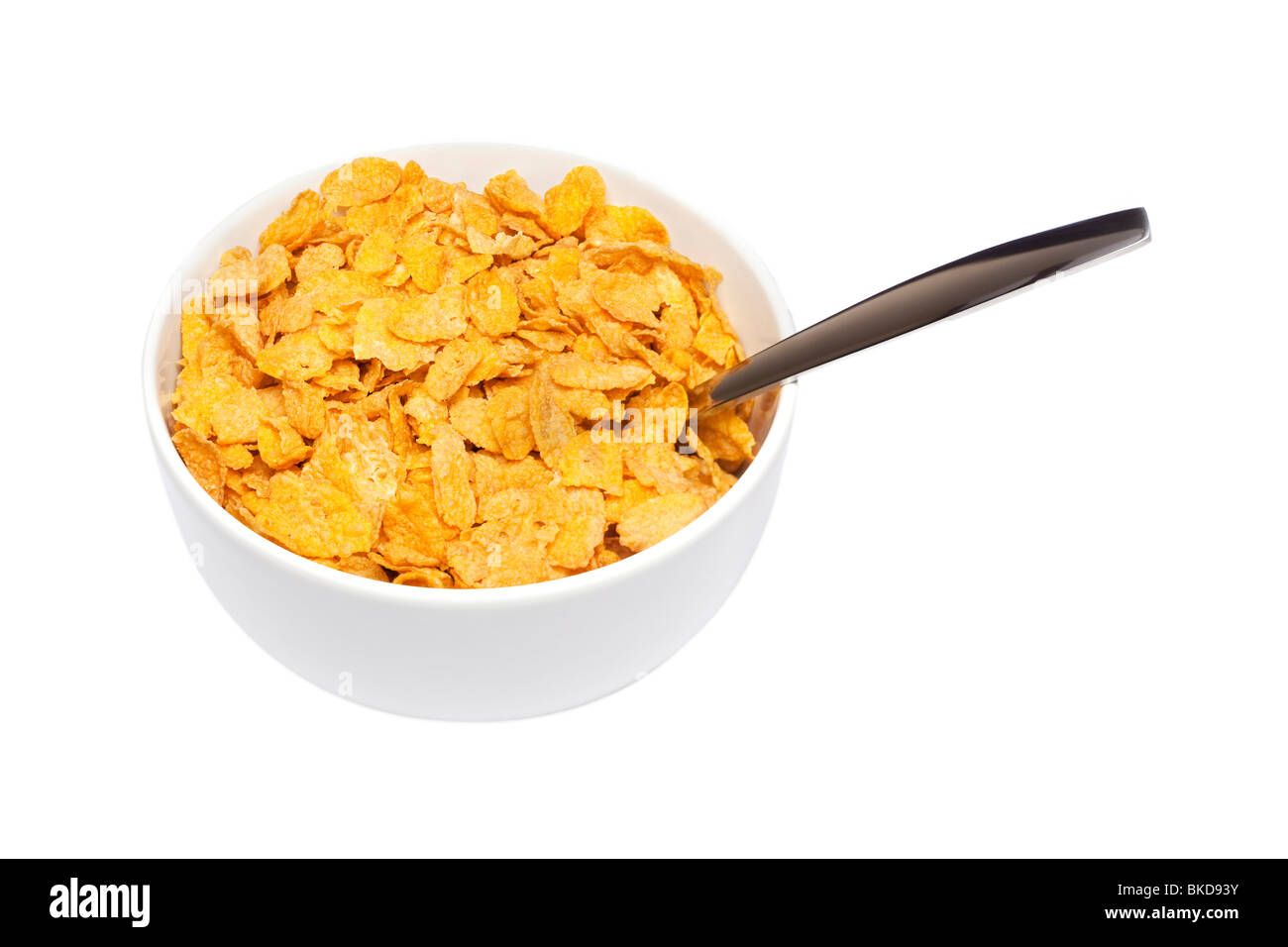 Cornflakes Müsli in eine weiße Schale mit Löffel Stockfoto