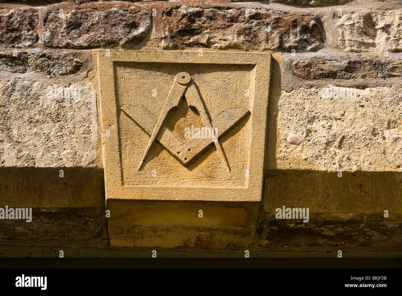 Freimaurer Symbol in Sandstein gehauen. , Stow-on-the-Wold Gloucestershire England Großbritannien Stockfoto