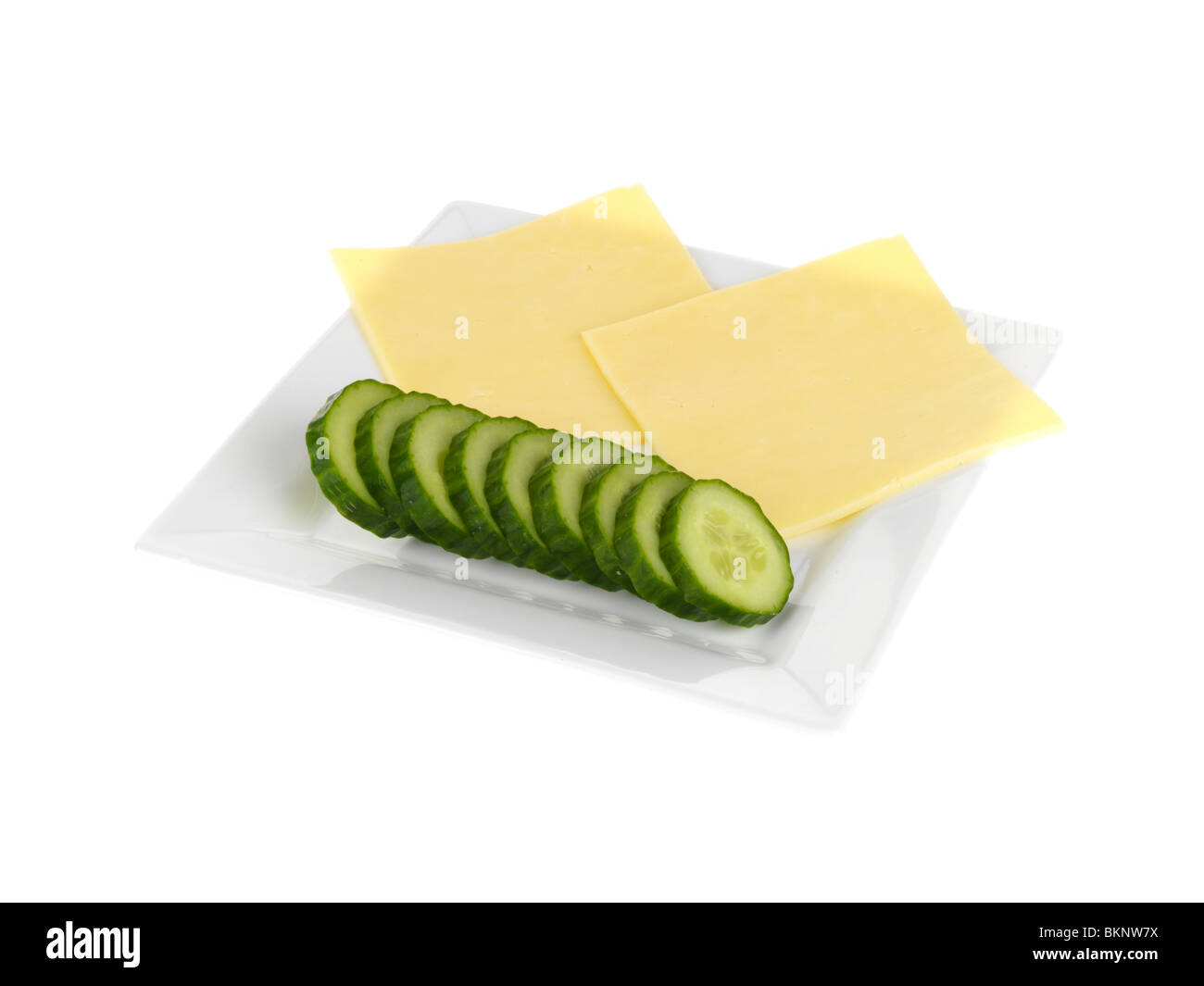 Cheddar-Käse mit Gurke Stockfoto