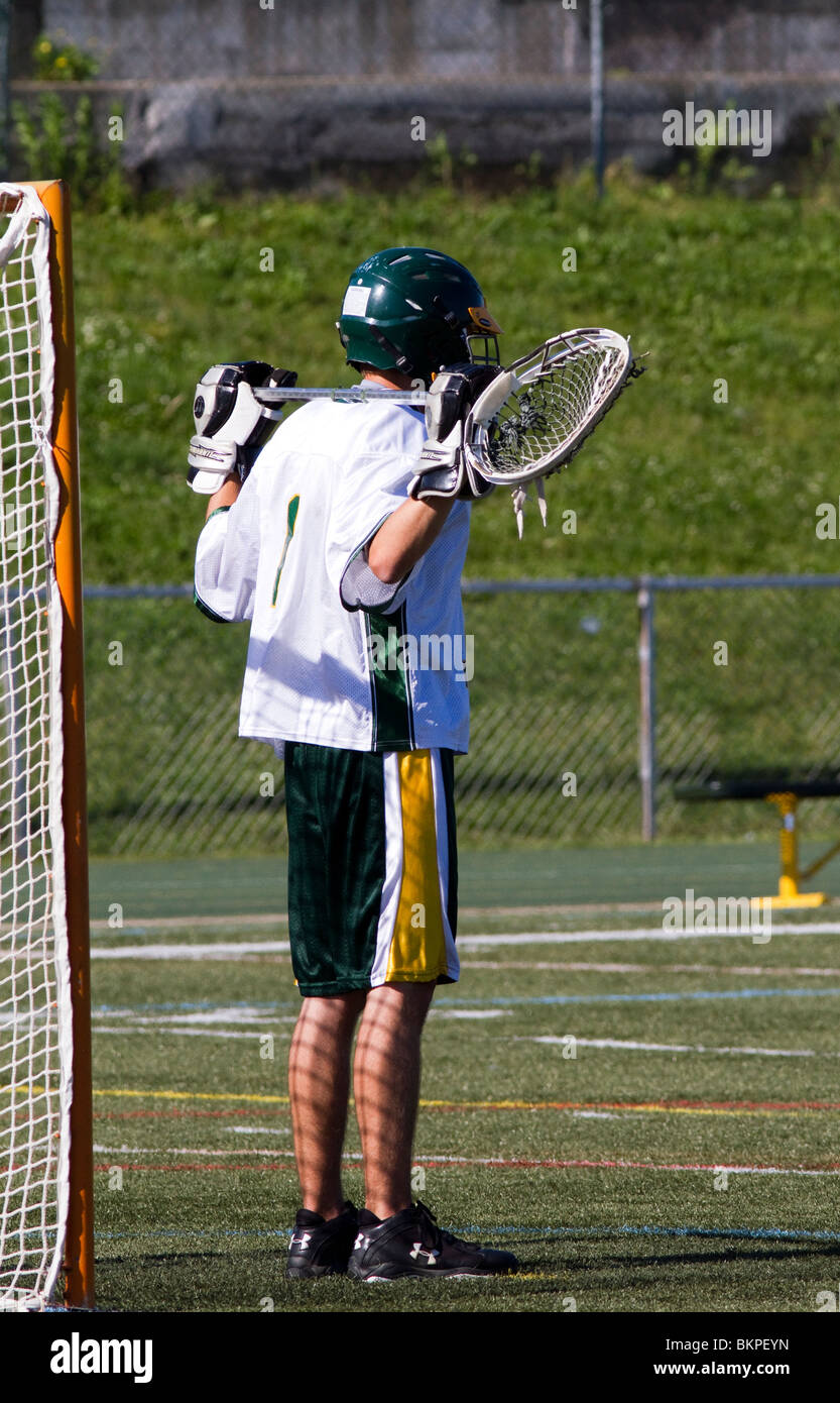 Jungen High School Varsity Lacrosse Spiel. Stockfoto