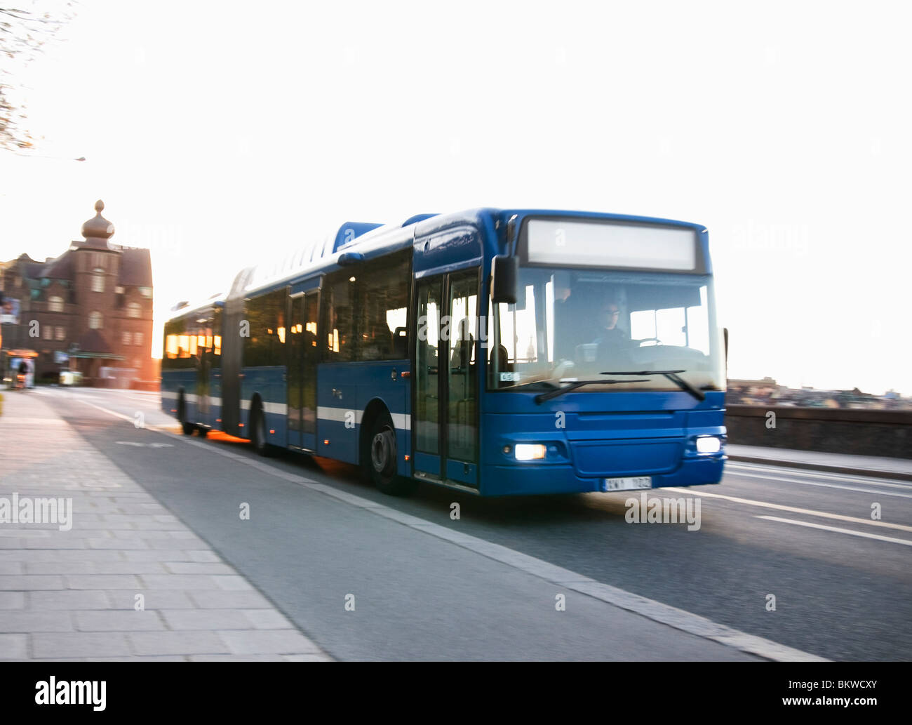 Stadt-Bus unterwegs Stockfoto