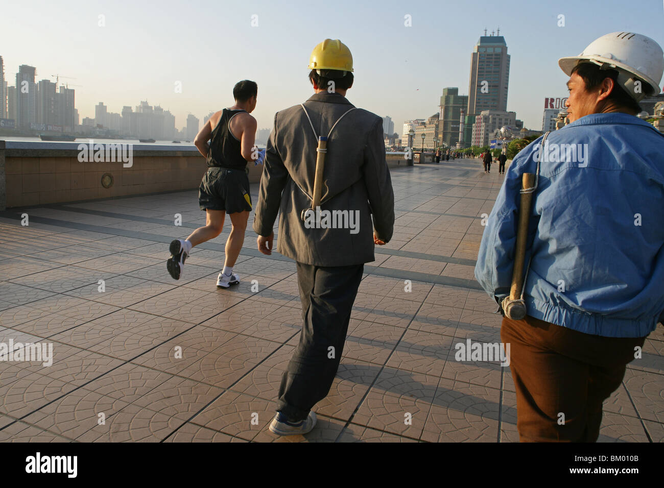 Bauarbeiter, jogger Stockfoto