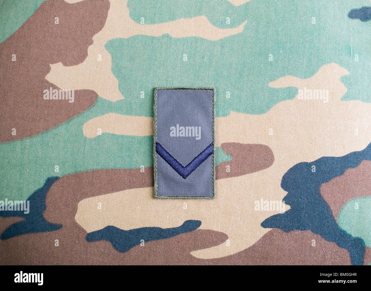 Militärische einheitliche Textur von grünen, blauen und braunen Farben Stockfoto
