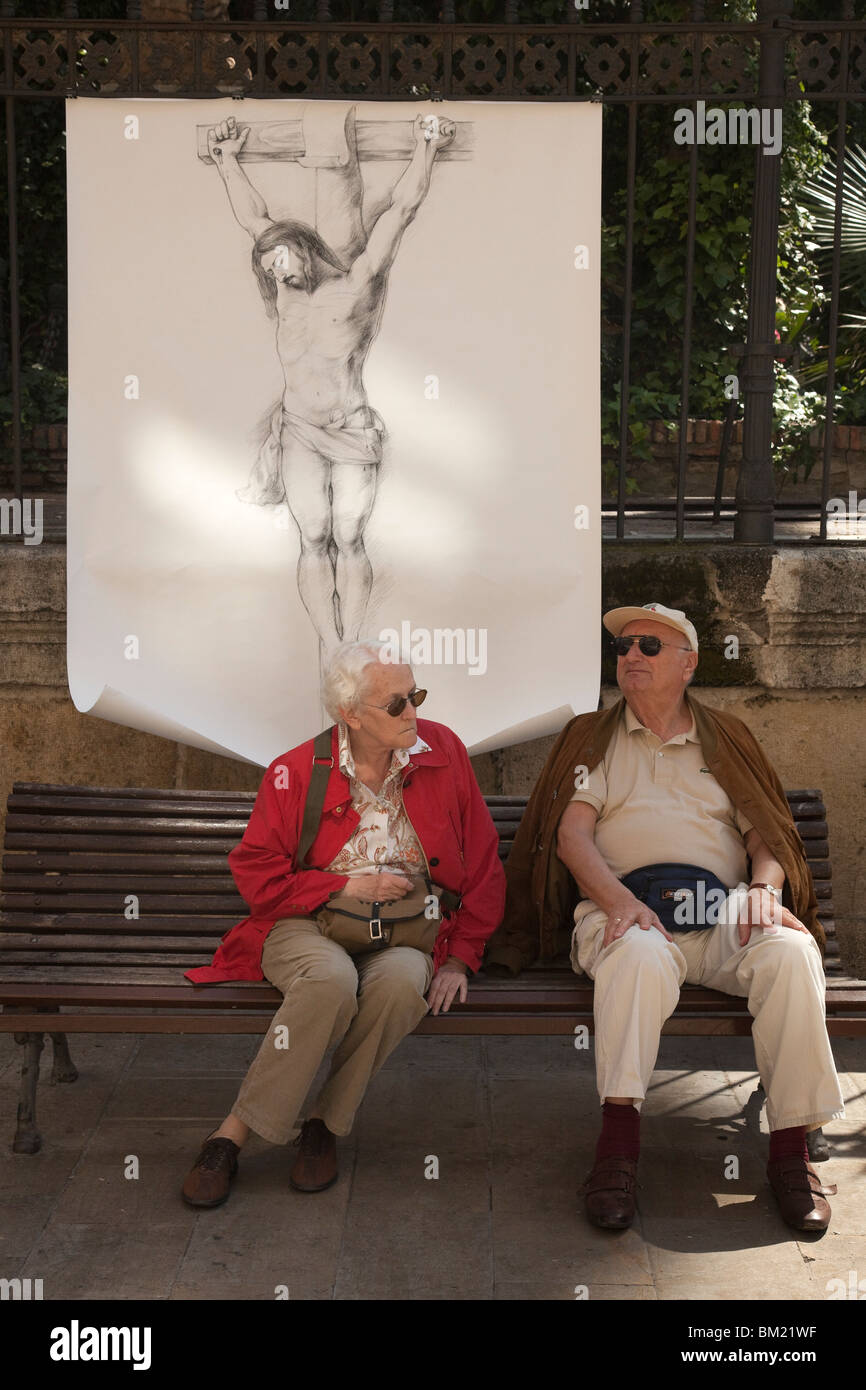 Straße Malerei von religiösen Themen zu Ostern außerhalb Kathedrale von Malaga, Malaga, Andalusien, Spanien Stockfoto