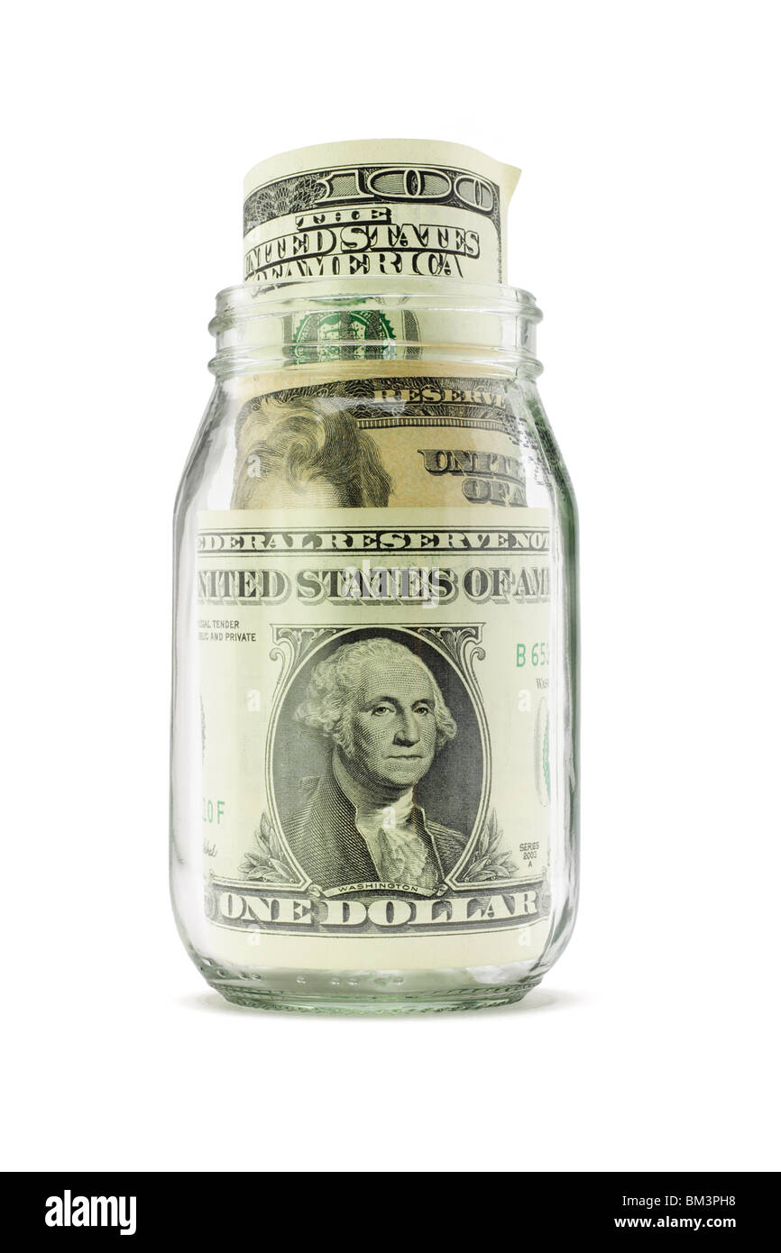 US-Dollarnoten in öffnen Glas auf weißem Hintergrund Stockfoto