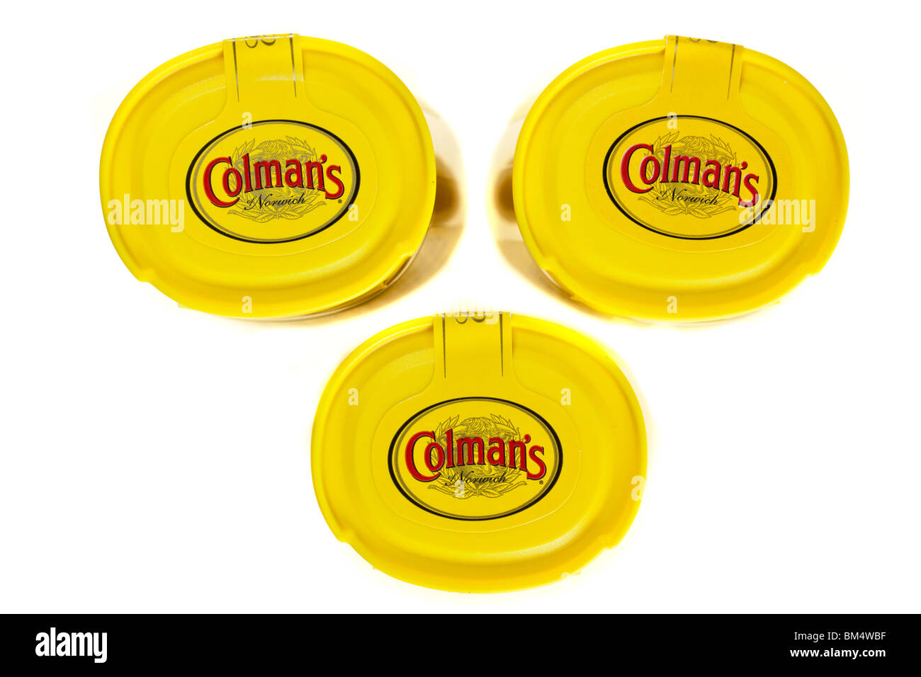 Drei Container Tops auf Colmans squeezable englischer Senf Stockfoto