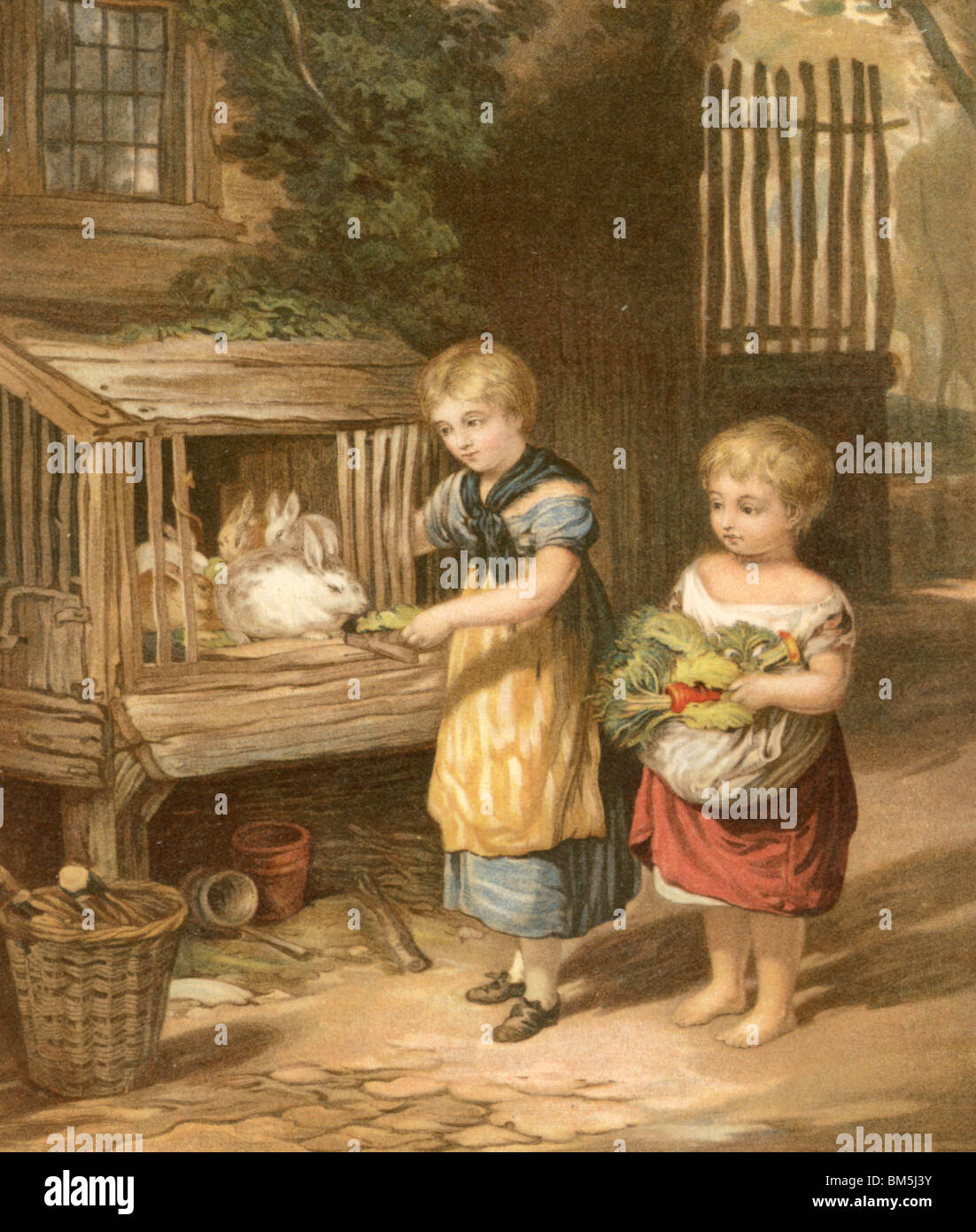 "Die Kinder und ihre Kaninchen" Stockfoto