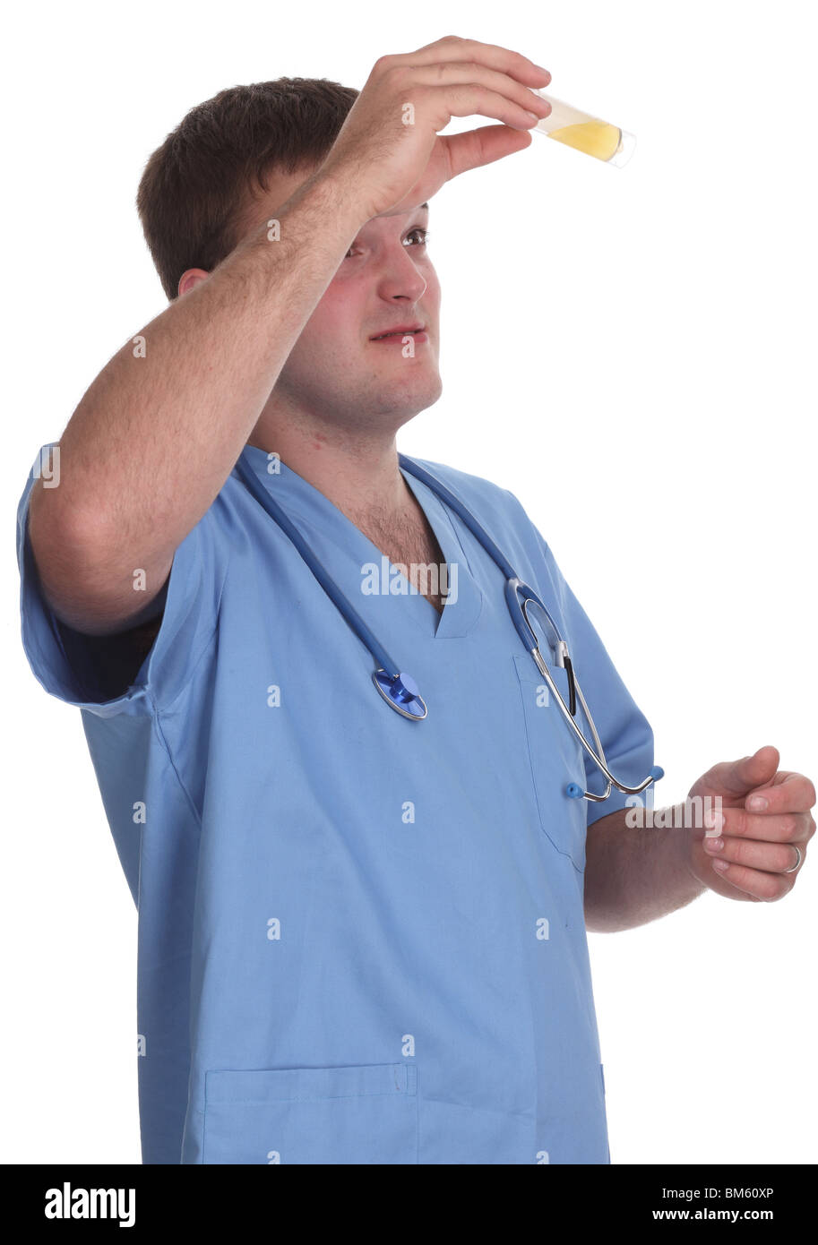 Mai 2010 - junges männliches Modell in medizinischen Schruben als männliche Krankenschwester, Stockfoto