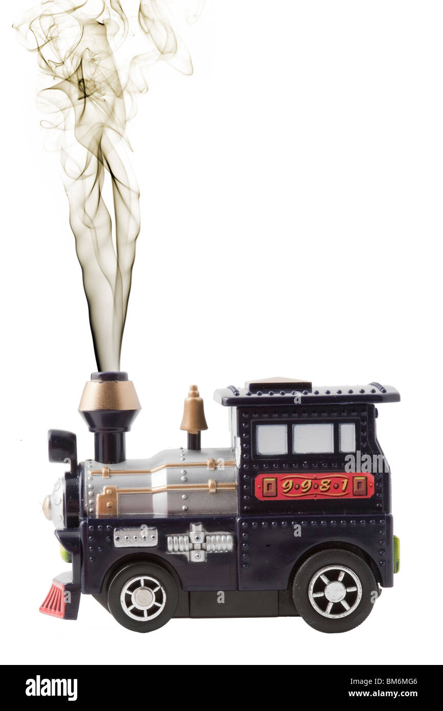 Spielzeug-Dampfmaschine mit Dampf aus Schornstein Stockfoto