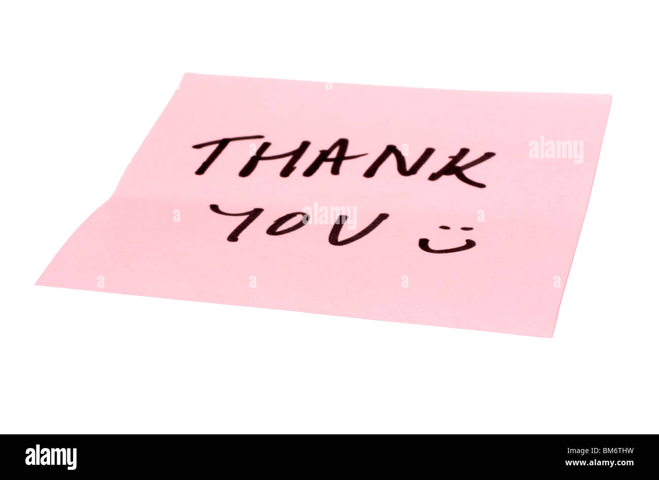 Text Thank You geschrieben eine haftende beachten Stockfoto