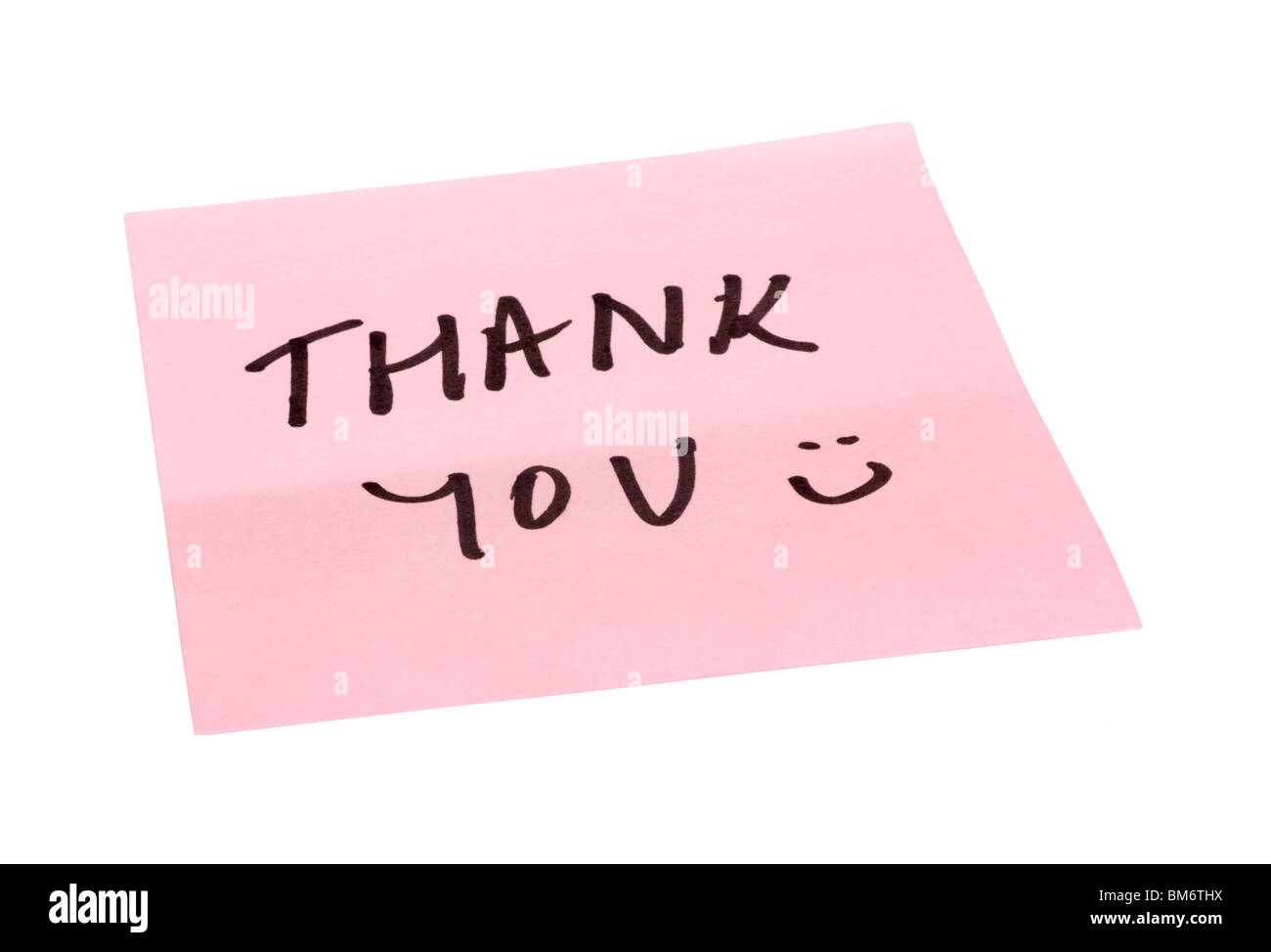 Text Thank You geschrieben eine haftende beachten Stockfoto